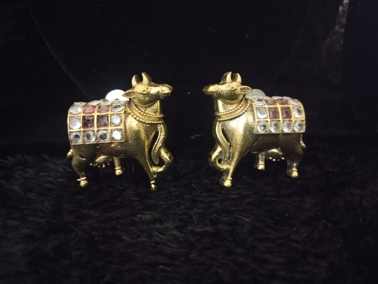 Kamdhenu-inspired stud earrings